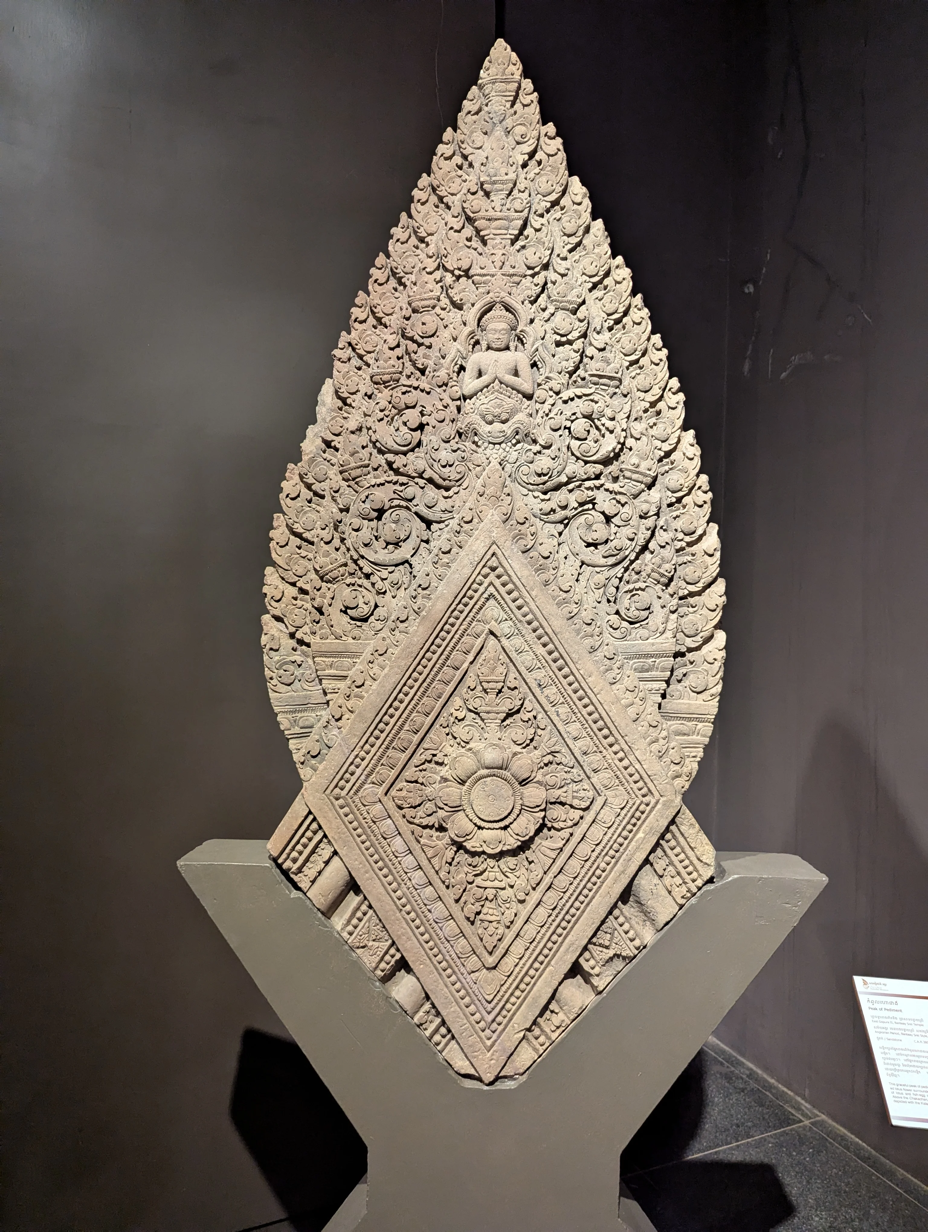 Ancient Khmer sculpture displayed inside Angkor National Museum